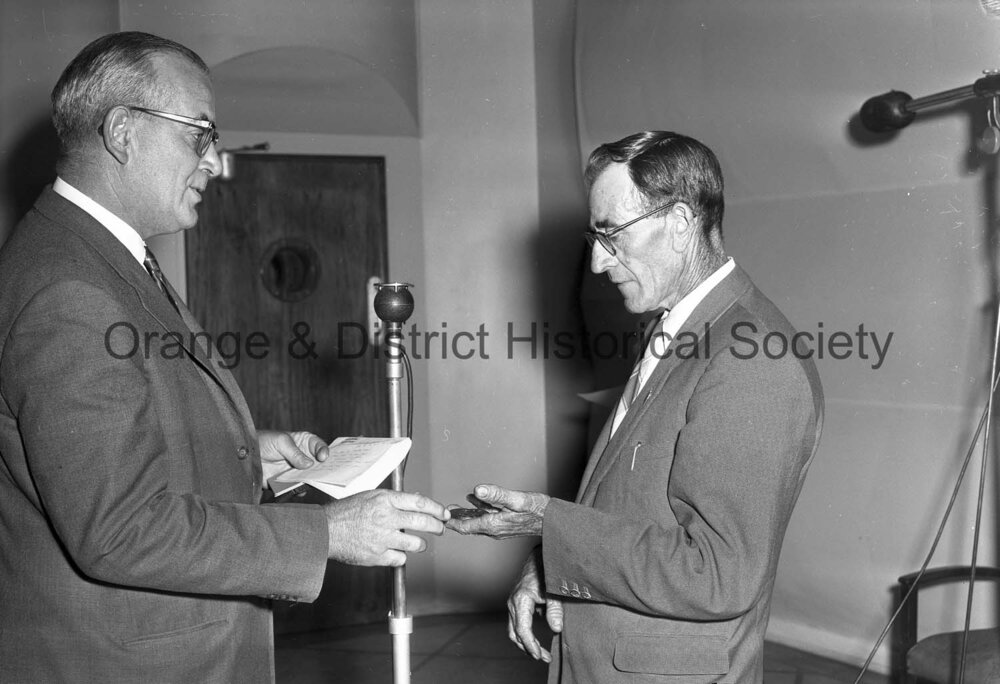 Ald Ridley presents medal to Walter  Uren