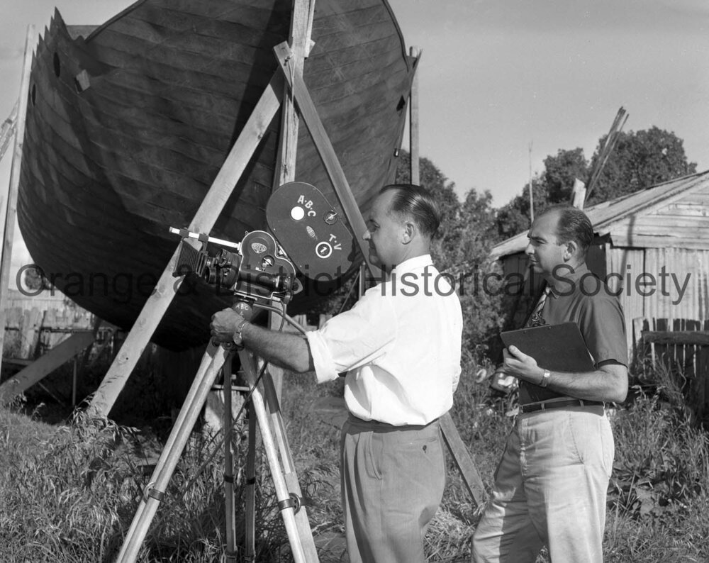 ABC cameraman filming boat building