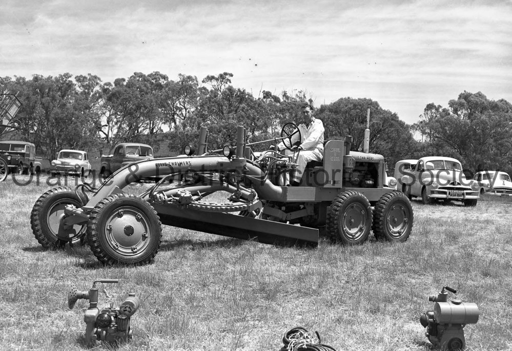 Tutt Bryant stand and grader at Field Days