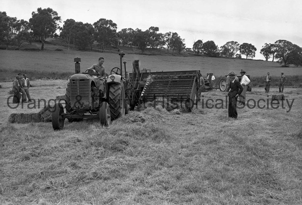 Massey Harris tractor and baler at Field Days