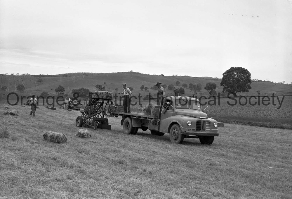 Massey Harris tractor and baler at Field Days