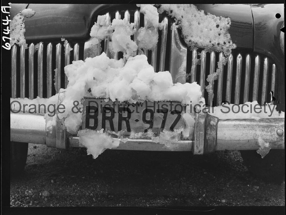 Number plate BRR 972 covered with snow
