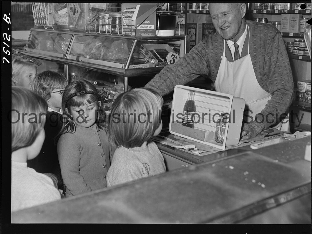 Mr J P Jaeger in his shop in Churchill Avenue