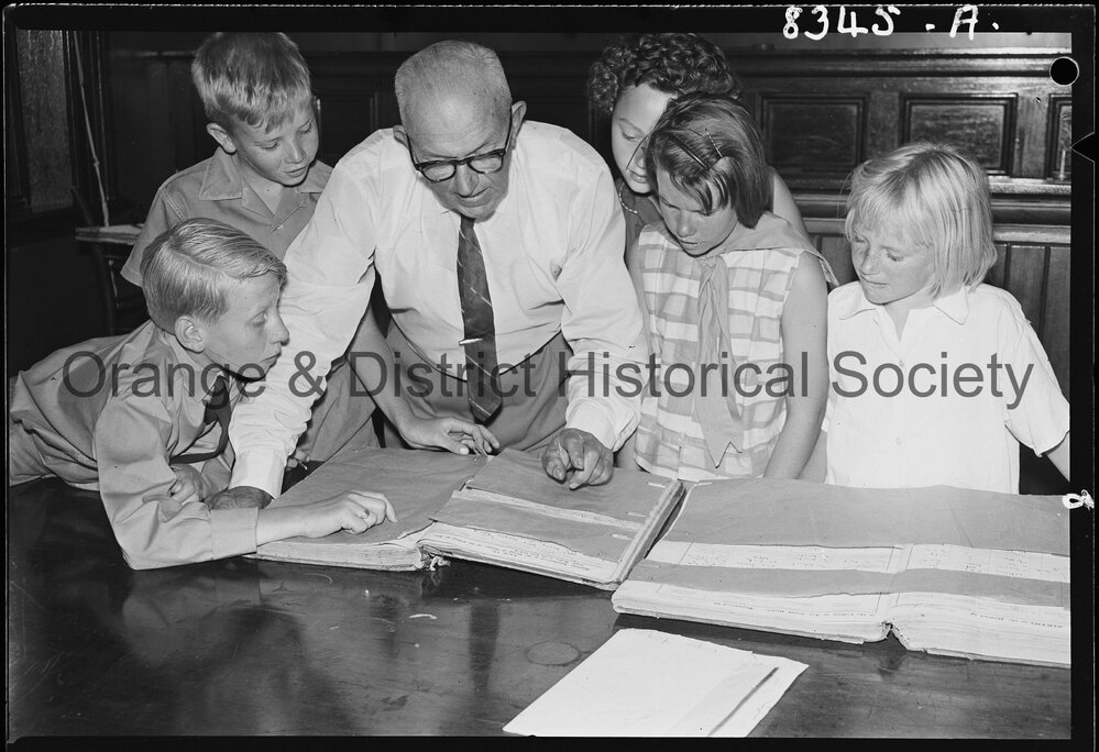 Mr R C Sheridan with Banjo Paterson's birth and baptism papers