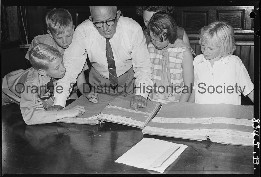 Mr R C Sheridan with Banjo Paterson's birth and baptism papers