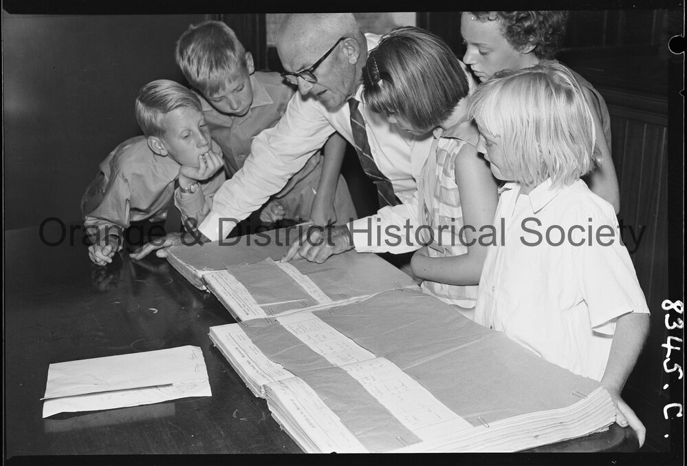 Mr R C Sheridan with Banjo Paterson's birth and baptism papers