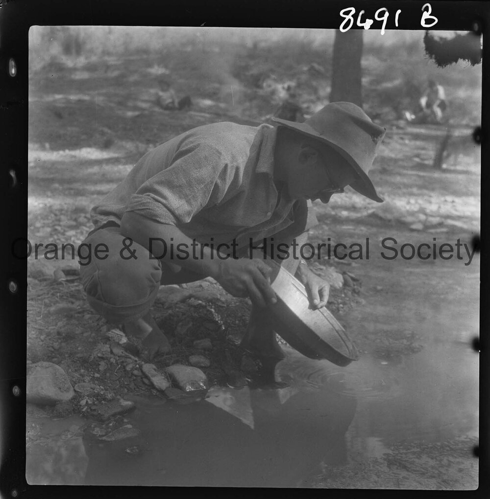 Scouts panning for gold