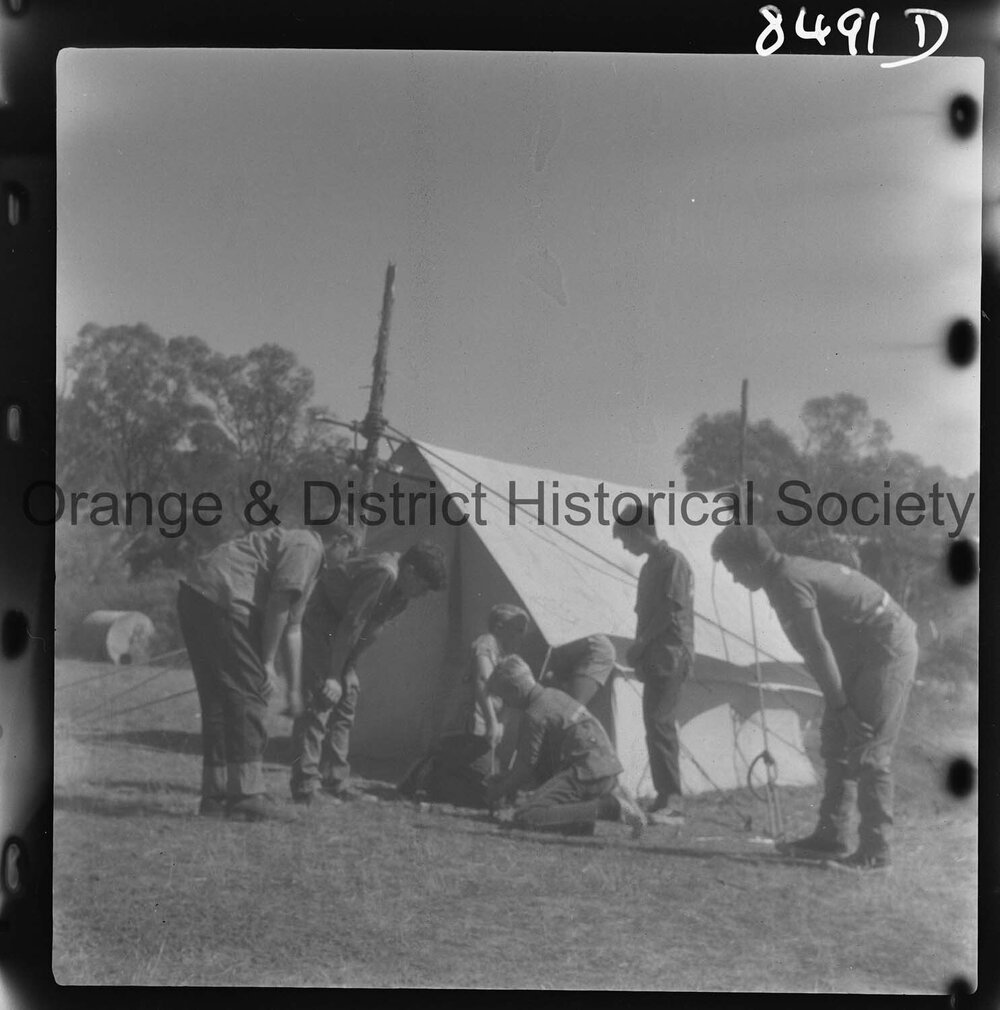 Scouts panning for gold