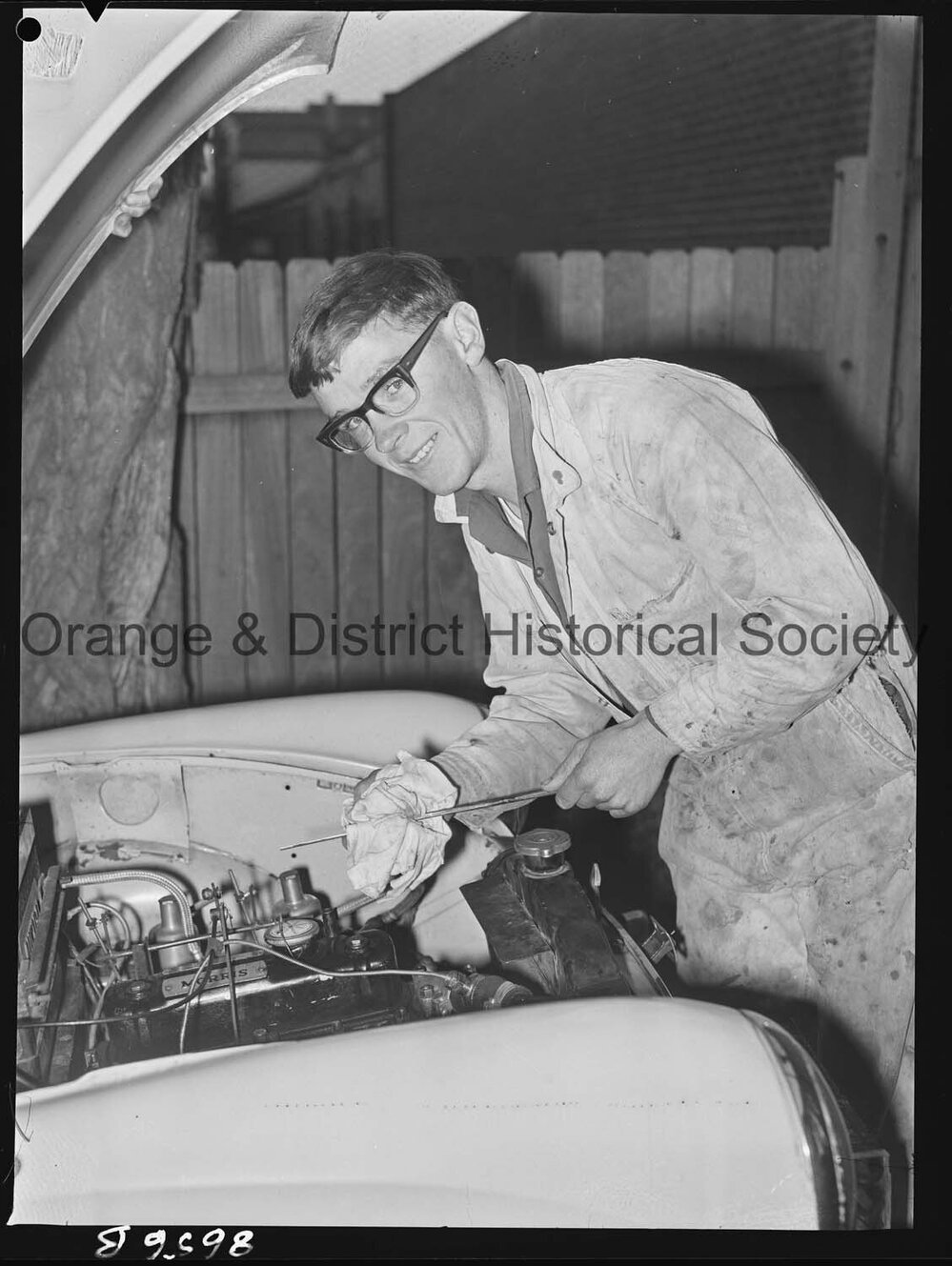 John Smith checks his Morris Minor