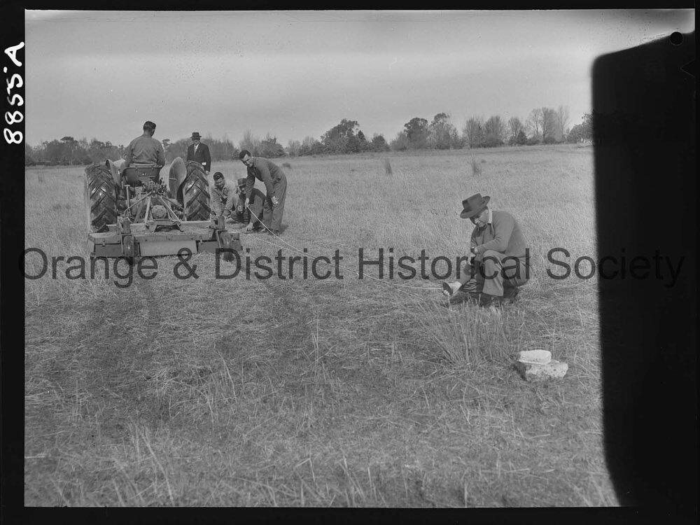 Council employees marking soccer field at Bloomfield aerodrome