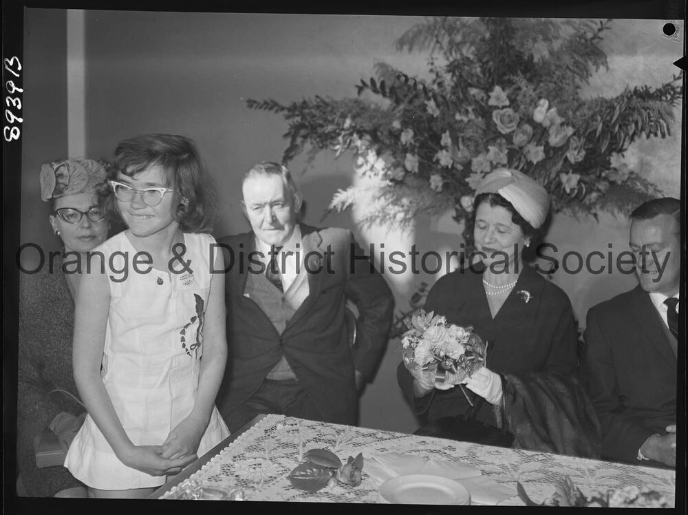 Kathleen Ratcliffe presents posy to Lady Moses