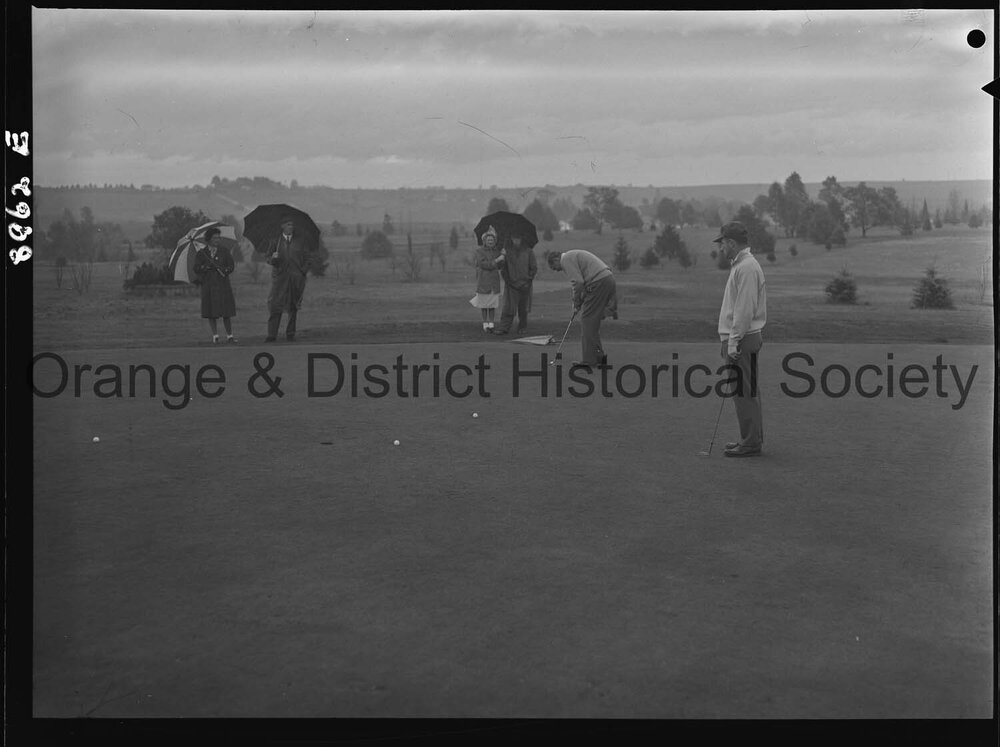 Visiting golfers play Orange Club