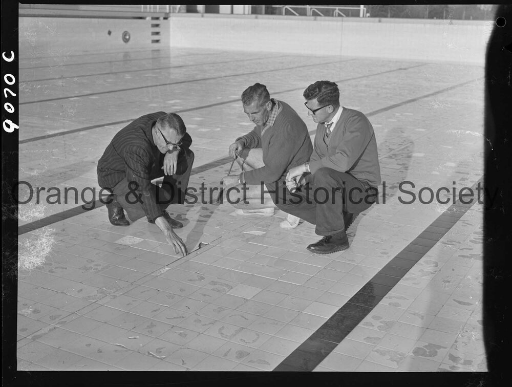 Inspecting Olympic pool