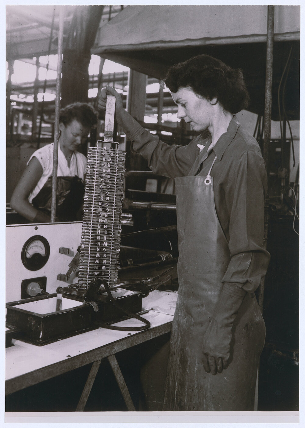 Gold-plating letters for refrigerators at the Emmco factory, Orange