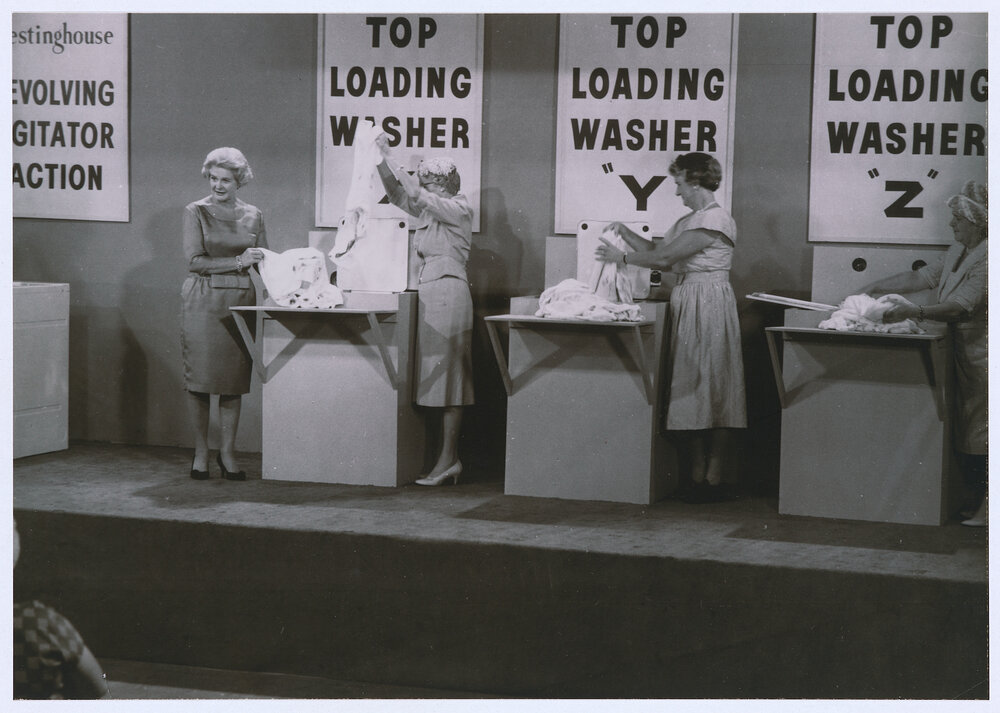 Which one washes the whitest: actor Gwen Plumb supervises a washing machine comparison