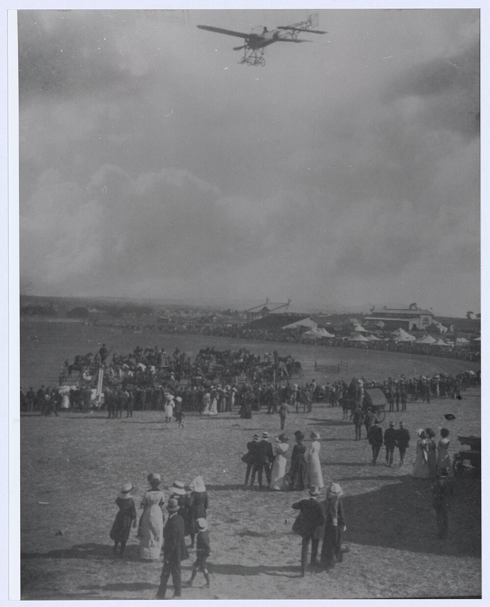 Bleriot type monoplane flying over the Orange Showground at the 1912 Show