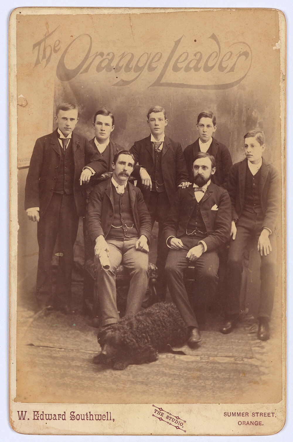George Willcox, six other men and a dog