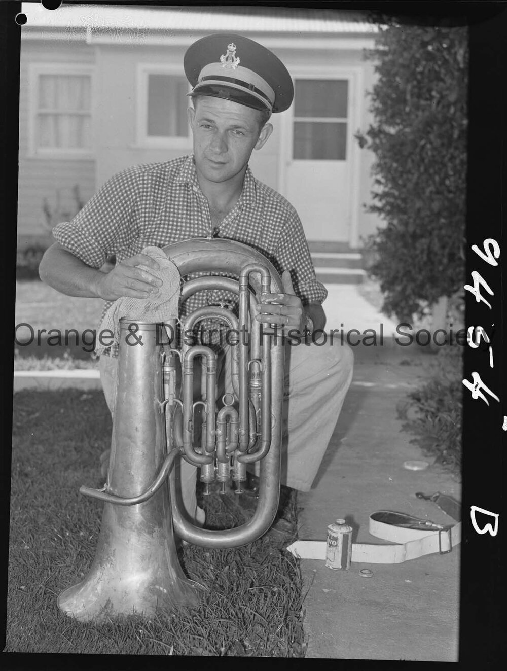 Elwyn McAlister cleaning his tuba