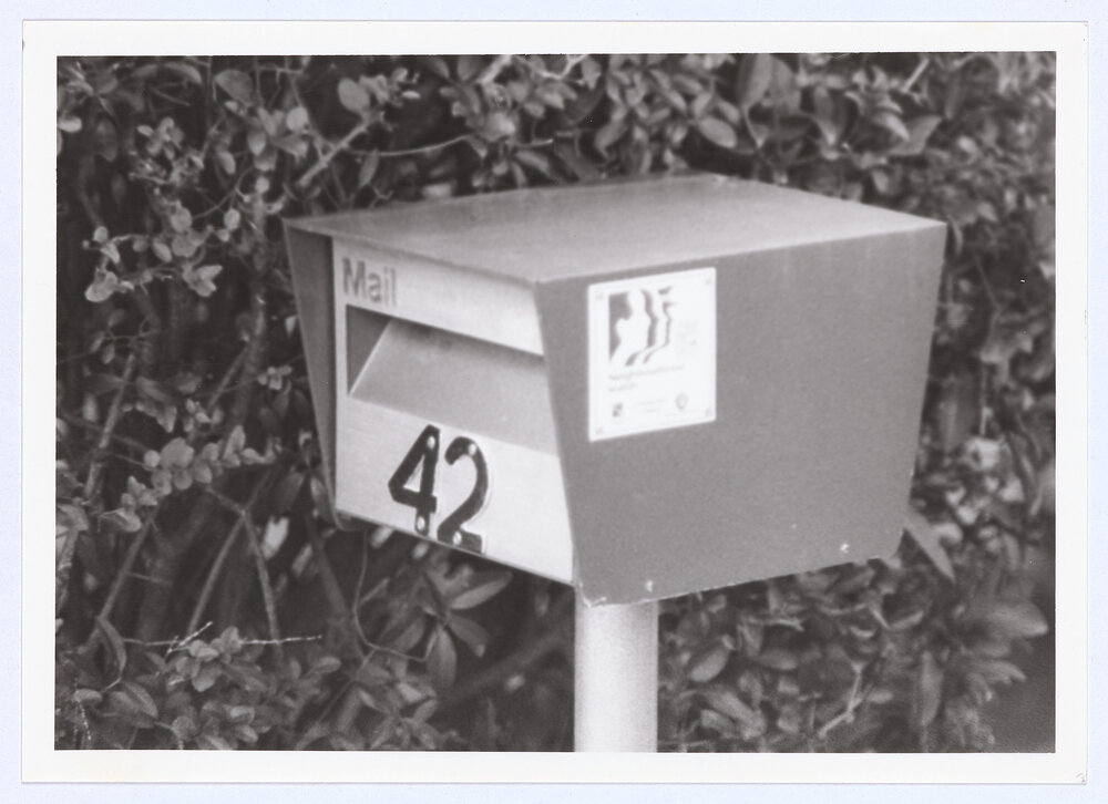 Letterbox with Neighbourhood Watch sticker