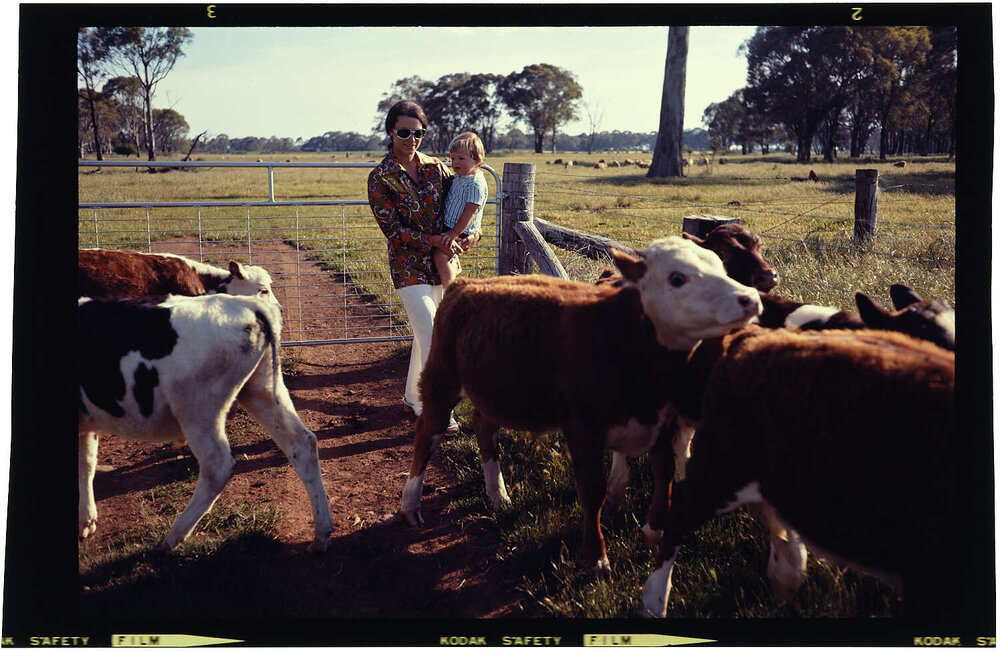 Woman and child with calves