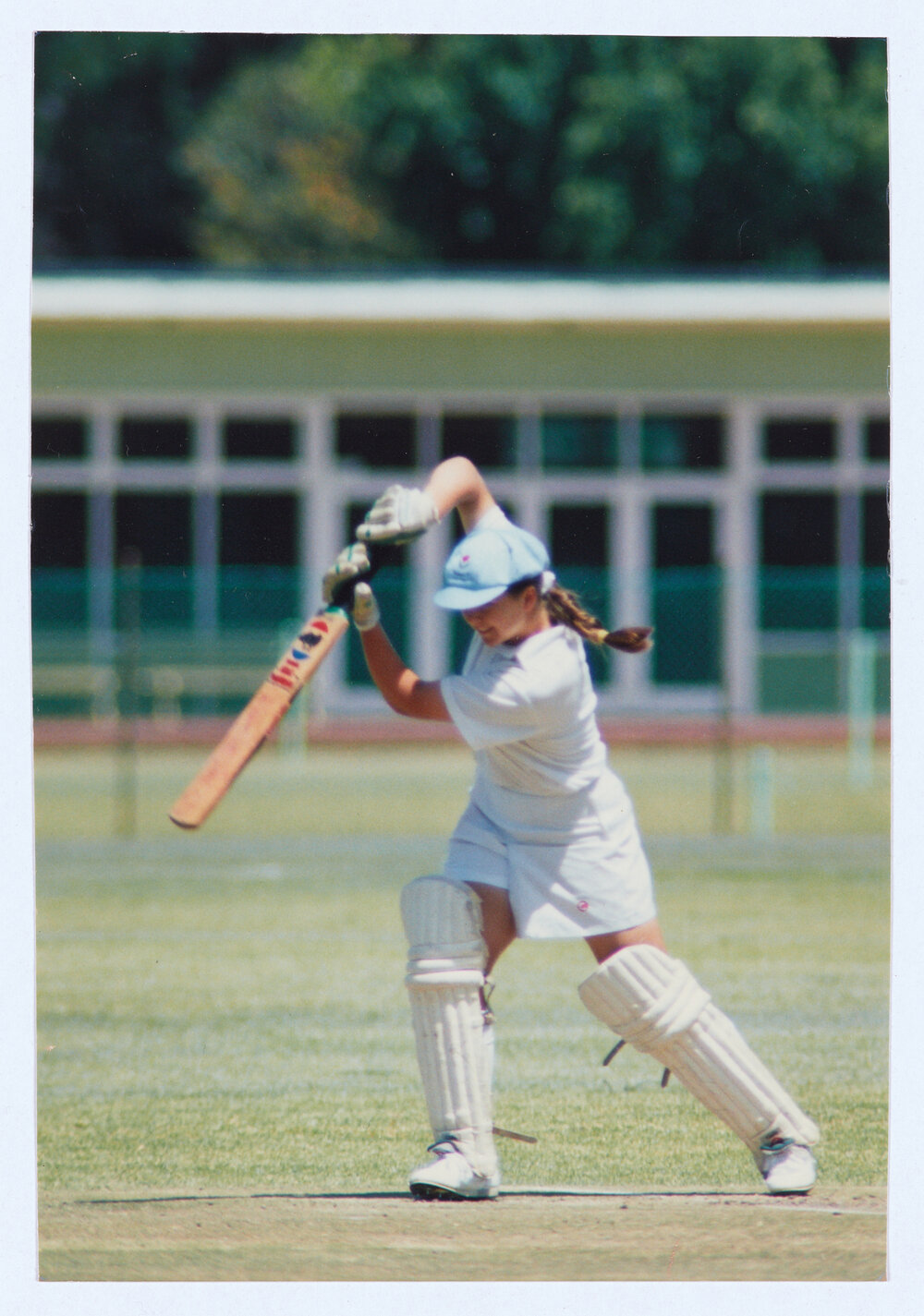 Woman playing cricket