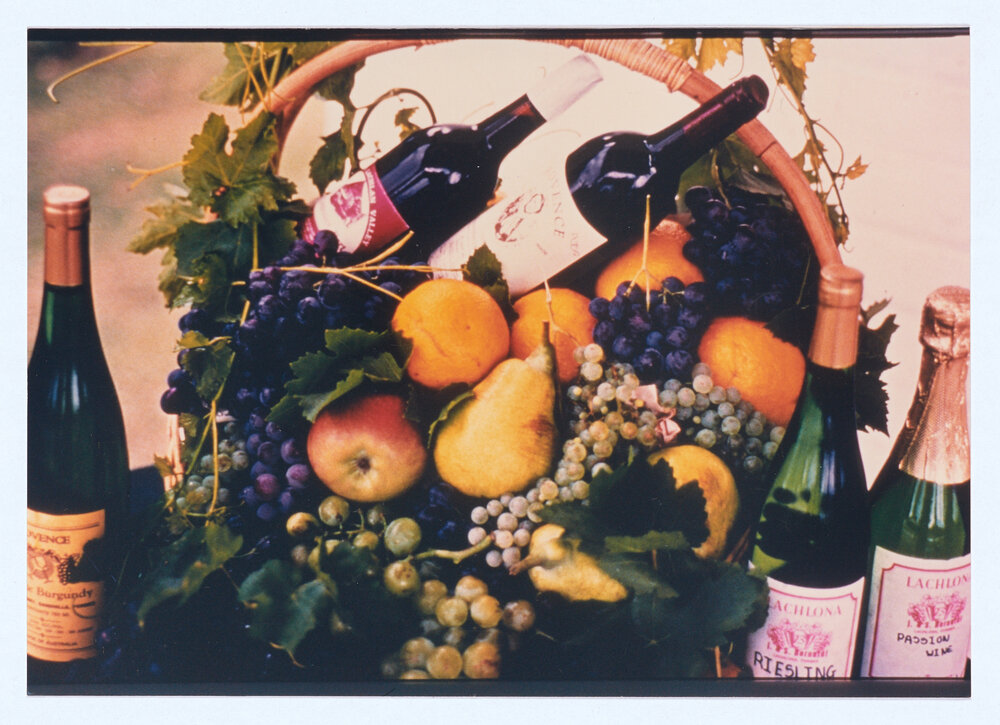 Basket of fruit and wine