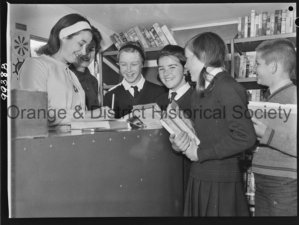 Bookmobiles visit Orange schools during Book Week