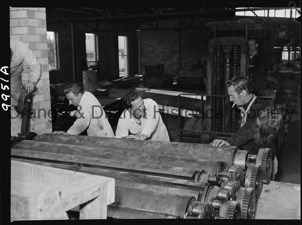 Unpacking the new printing press at the Central Western Daily