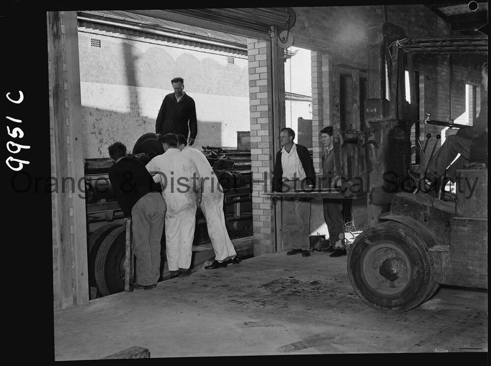 Unpacking the new printing press at the Central Western Daily