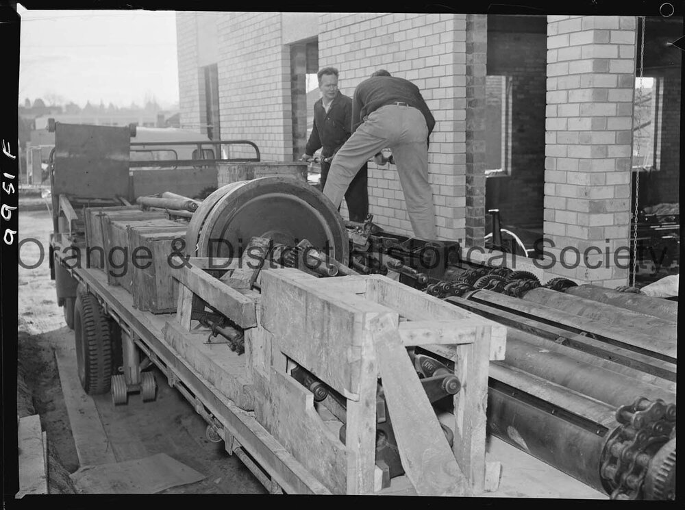 Unpacking the new printing press at the Central Western Daily