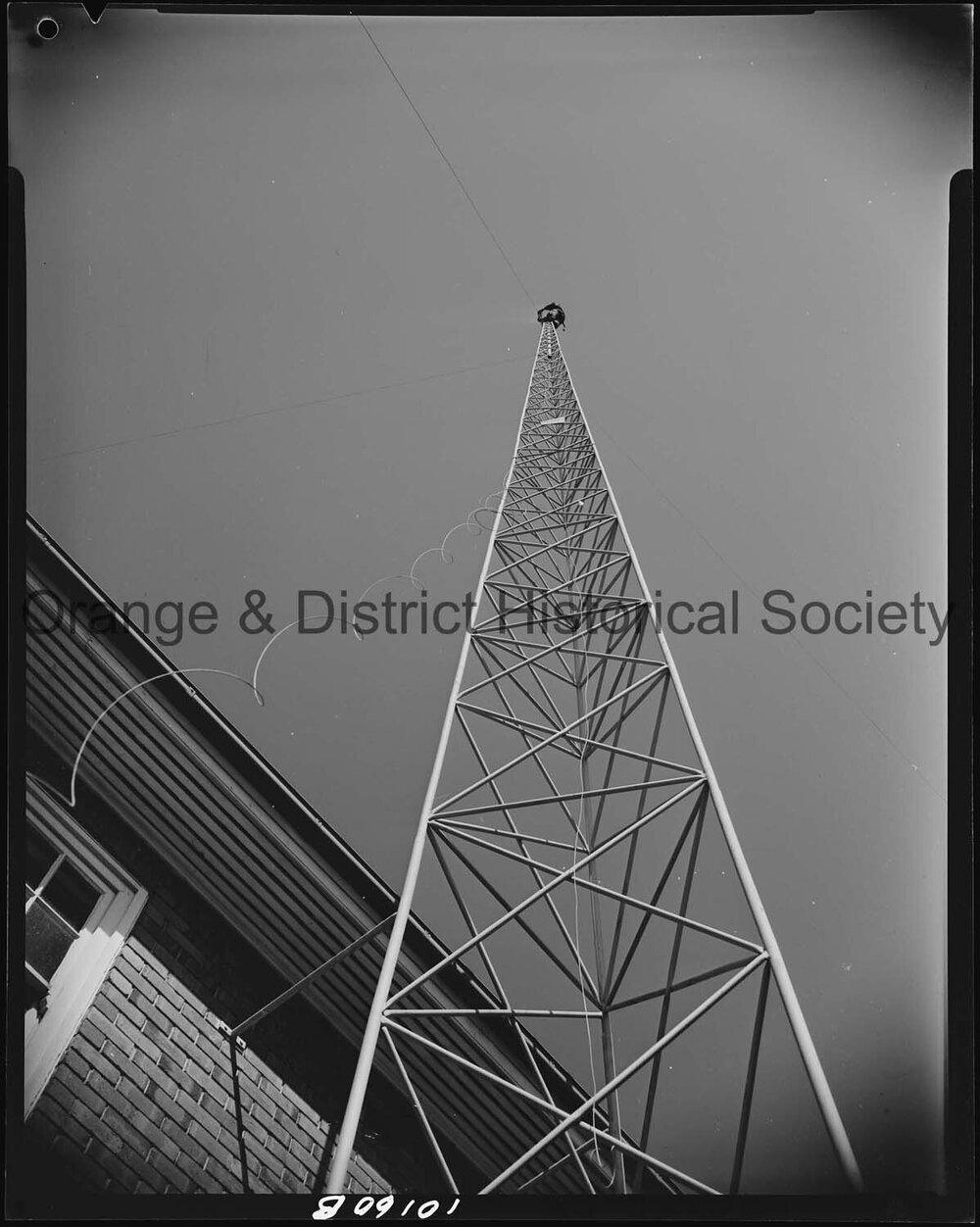 Affix aerial to radio tower at Ambulance Station