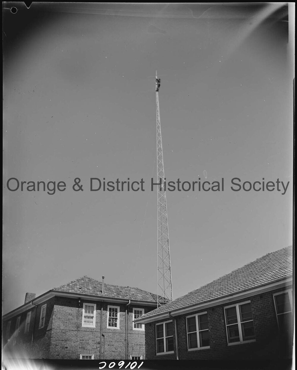 Affix aerial to radio tower at Ambulance Station