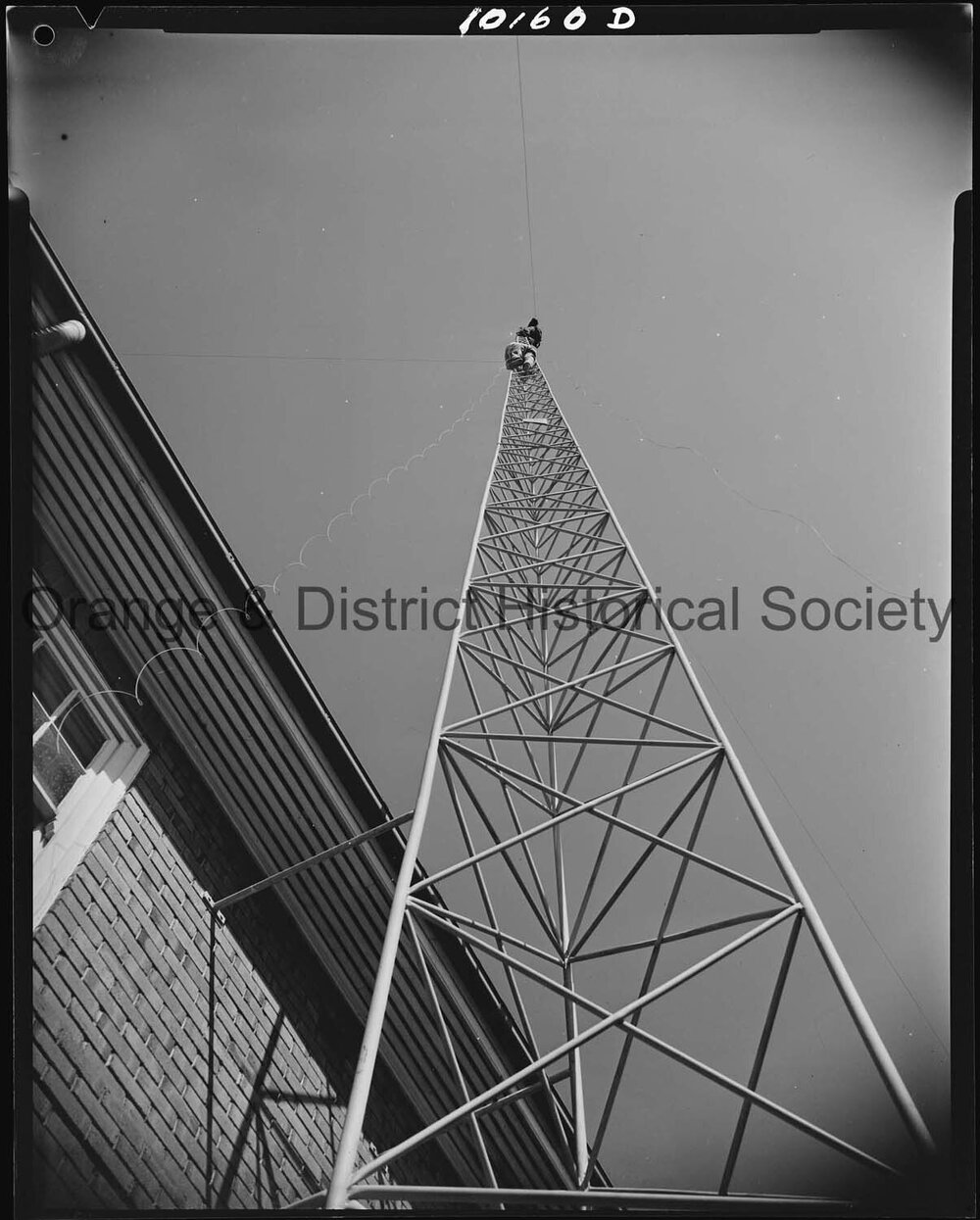 Affix aerial to radio tower at Ambulance Station