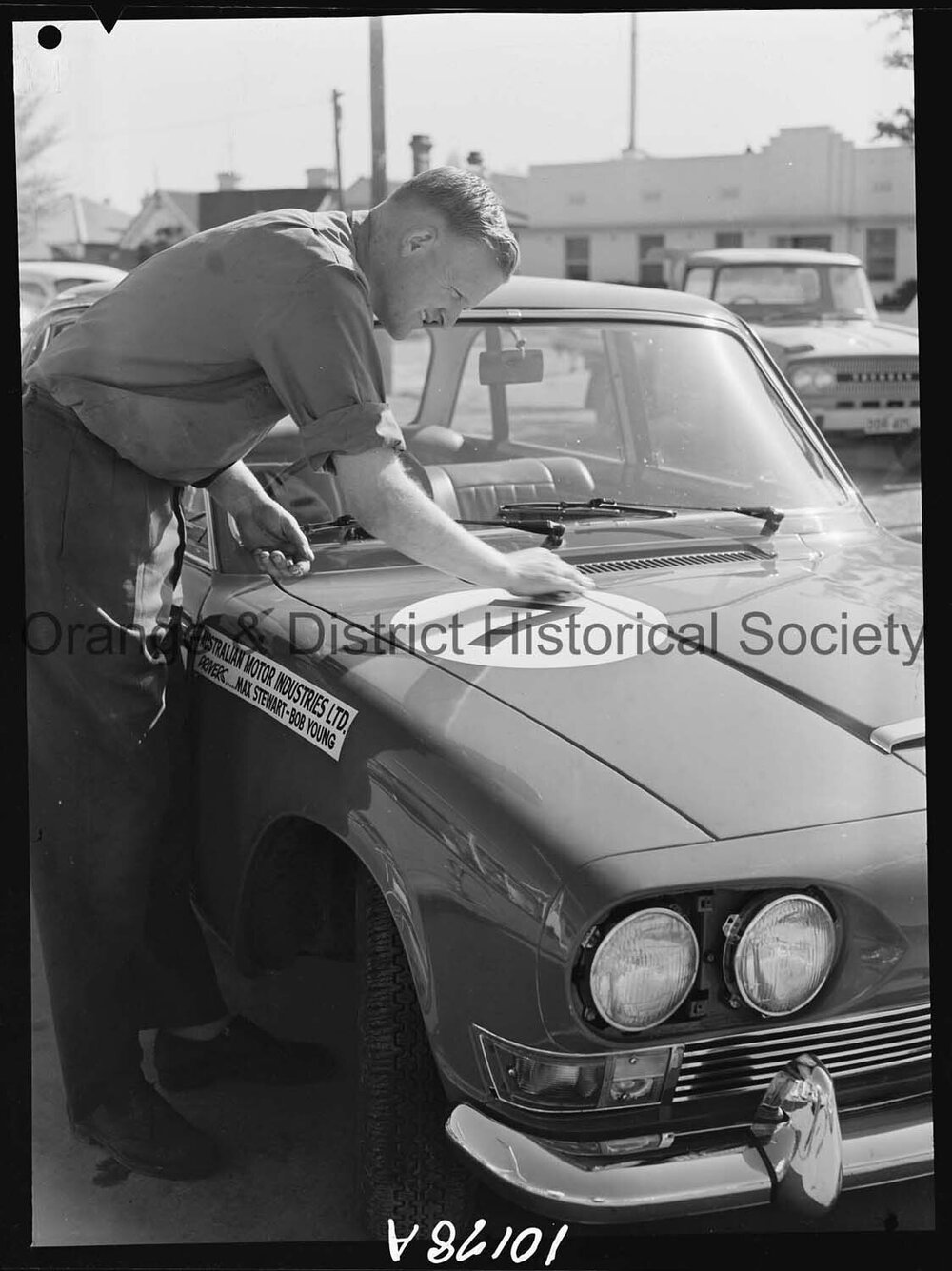 Adjusting number on Triumph for big car race