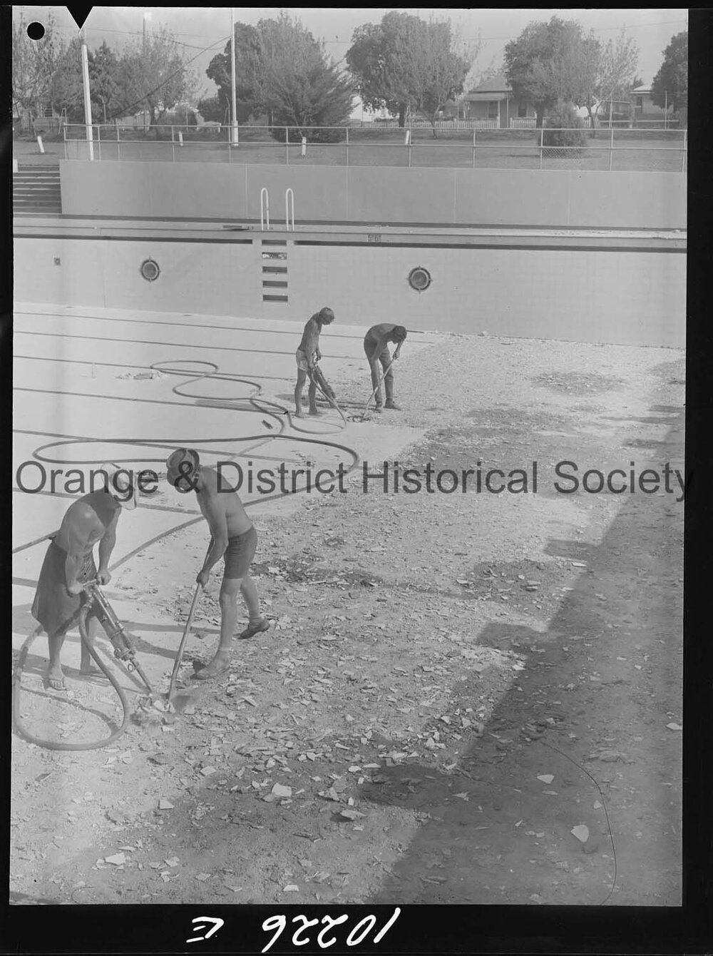 Olympic pool diving board gets a paint over