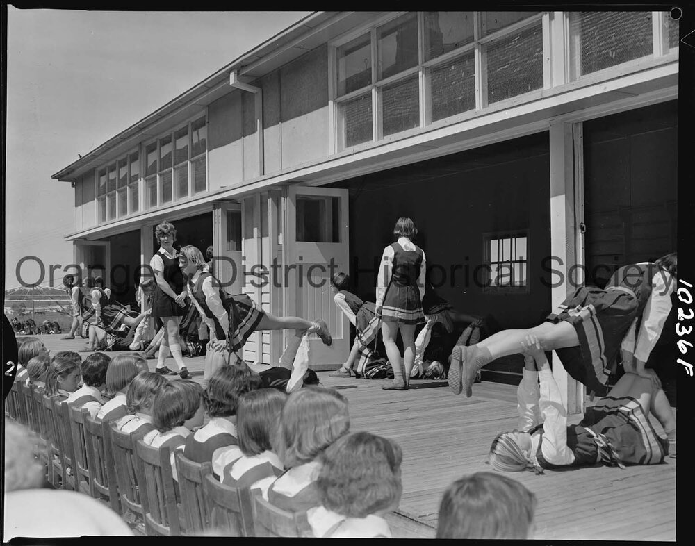 Physical education display by pupils at PLC