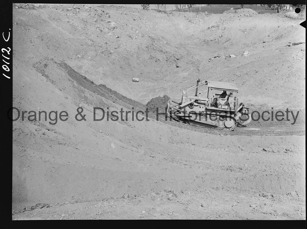 Buttsworth earth scoop