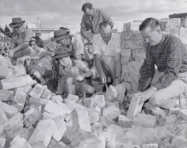 Cleaning of the second-hand bricks was undertaken by volunteers
