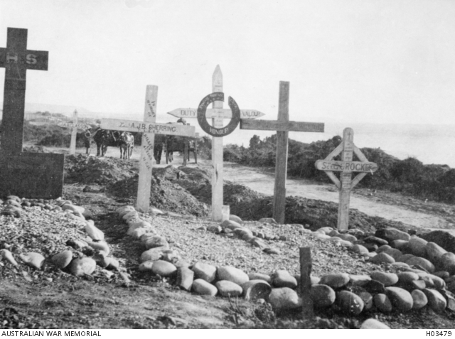 The white cross with black circle marks the grave of 2607 Private Horace Kurnell Weaver, Beach Cemetery, Gallipoli