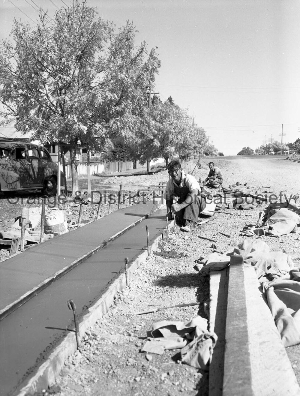 Men working on road in Sampson Street