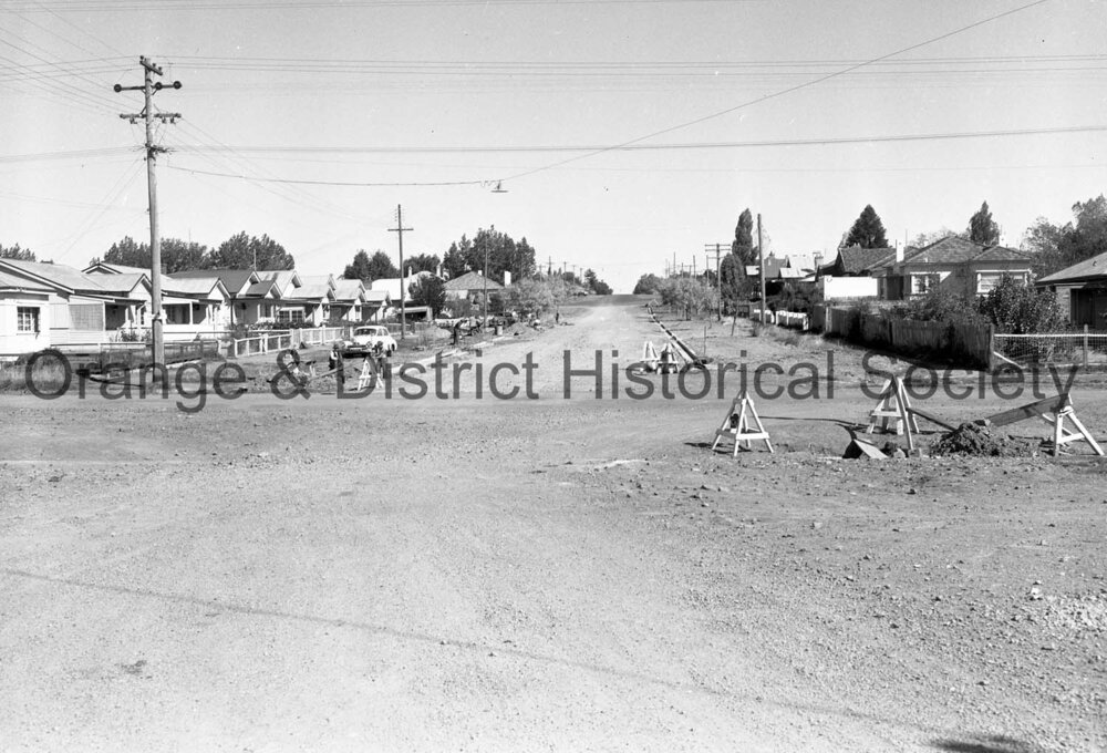 Men working on road in Sampson Street