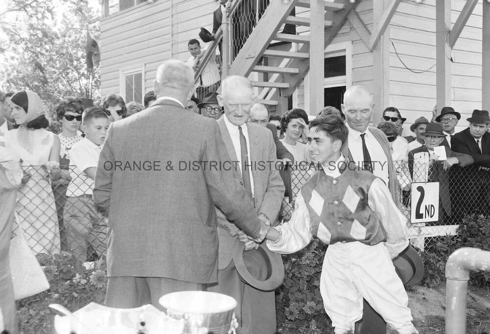 Orange Cup presentation to winning jockey