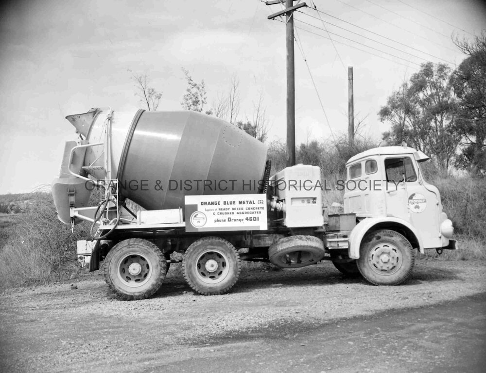 Truck with load of blue metal