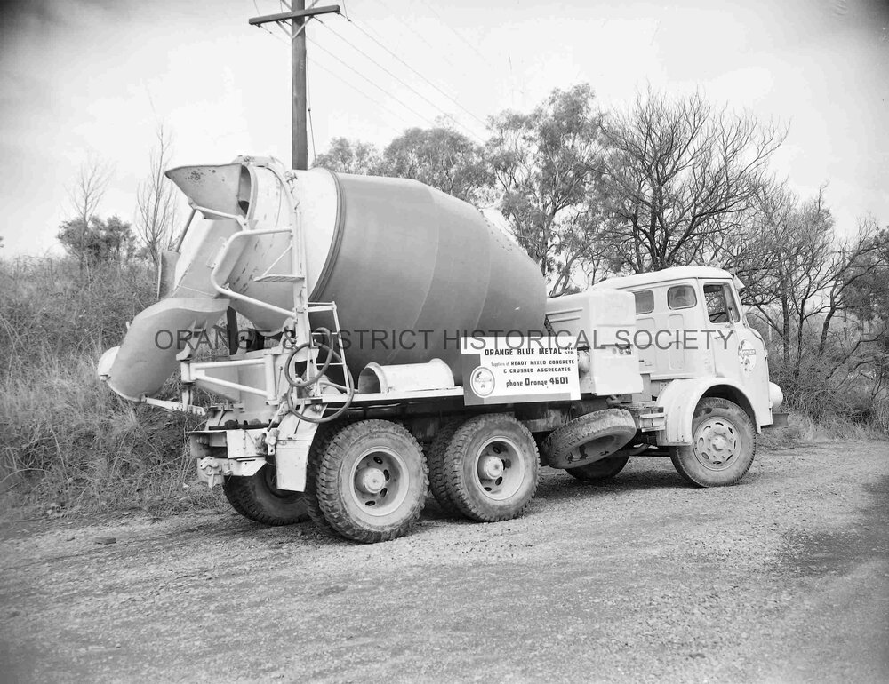 Truck with load of blue metal