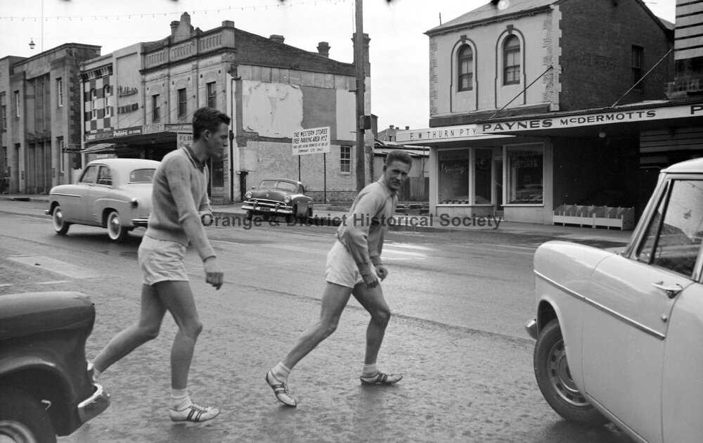 Runners crossing Summer Street