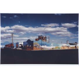 Postcard style photograph of mural on Gas Works brick wall