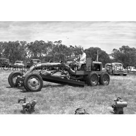 Tutt Bryant stand and grader at Field Days