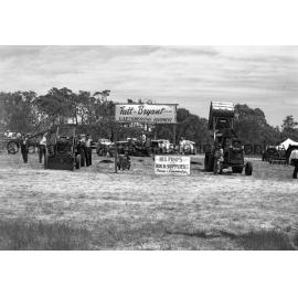 Tutt Bryant stand and grader at Field Days