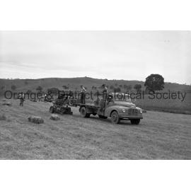 Massey Harris tractor and baler at Field Days