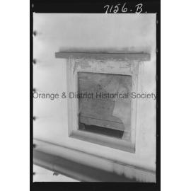 Mrs M Walker shows where vandals broke windows and lit fires at her home